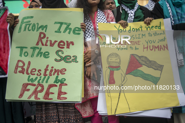 Students of Dhaka University organize a ''March for Palestine'' in Dhaka, Bangladesh, on November 29, 2024, to mark the International Day of...