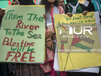 Students of Dhaka University organize a ''March for Palestine'' in Dhaka, Bangladesh, on November 29, 2024, to mark the International Day of...