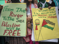 Students of Dhaka University organize a ''March for Palestine'' in Dhaka, Bangladesh, on November 29, 2024, to mark the International Day of...