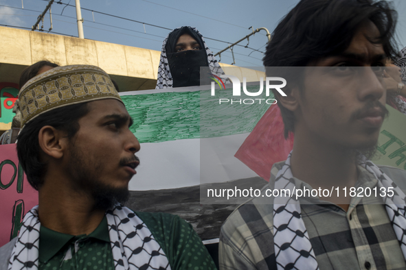 Students of Dhaka University organize a ''March for Palestine'' in Dhaka, Bangladesh, on November 29, 2024, to mark the International Day of...