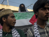 Students of Dhaka University organize a ''March for Palestine'' in Dhaka, Bangladesh, on November 29, 2024, to mark the International Day of...