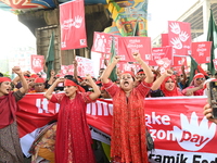 Activists of the Sammilito Garments Sramik Federation (Combined Garments Workers Federation) stage a protest procession against Amazon Compa...