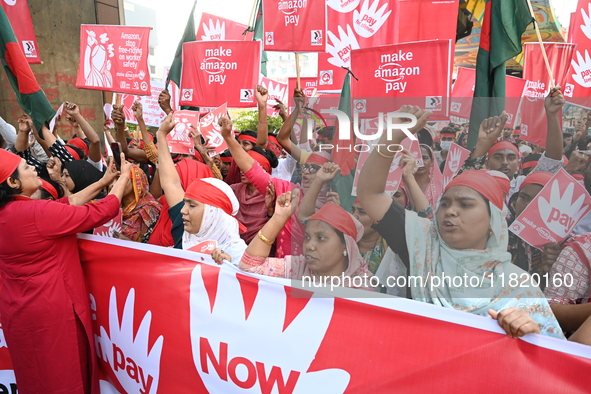 Activists of the Sammilito Garments Sramik Federation (Combined Garments Workers Federation) stage a protest procession against Amazon Compa...