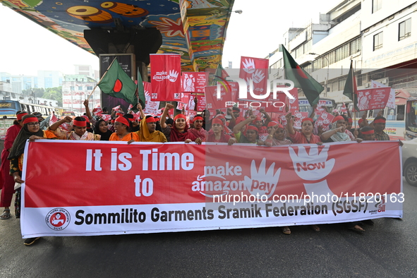 Activists of the Sammilito Garments Sramik Federation (Combined Garments Workers Federation) stage a protest procession against Amazon Compa...