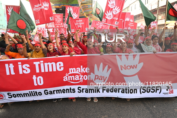 Activists of the Sammilito Garments Sramik Federation (Combined Garments Workers Federation) stage a protest procession against Amazon Compa...