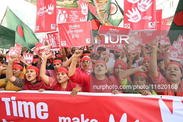 Activists of the Sammilito Garments Sramik Federation (Combined Garments Workers Federation) stage a protest procession against Amazon Compa...