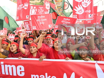 Activists of the Sammilito Garments Sramik Federation (Combined Garments Workers Federation) stage a protest procession against Amazon Compa...