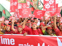 Activists of the Sammilito Garments Sramik Federation (Combined Garments Workers Federation) stage a protest procession against Amazon Compa...