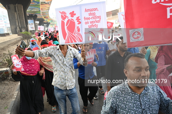 Activists of the Sammilito Garments Sramik Federation (Combined Garments Workers Federation) stage a protest procession against Amazon Compa...