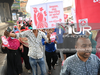 Activists of the Sammilito Garments Sramik Federation (Combined Garments Workers Federation) stage a protest procession against Amazon Compa...