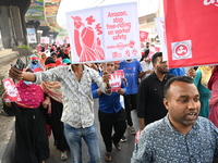 Activists of the Sammilito Garments Sramik Federation (Combined Garments Workers Federation) stage a protest procession against Amazon Compa...