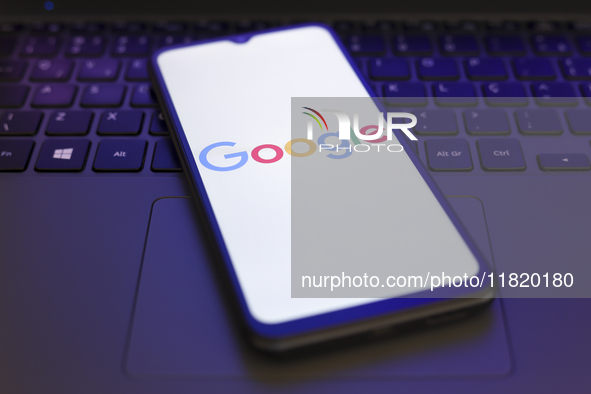 The Google logo appears on the screen of a smartphone in Reno, United States, on November 29, 2024. 