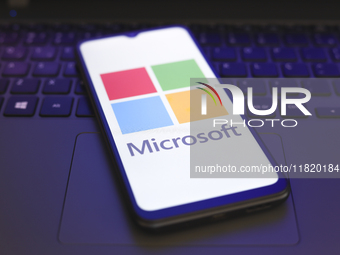 The Microsoft Corporation logo appears on the screen of a smartphone in Reno, United States, on November 29, 2024. (