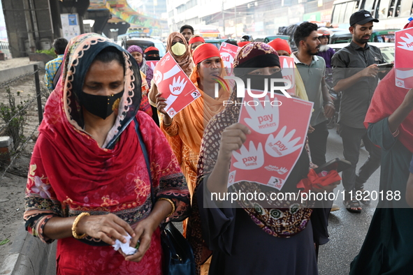 Activists of the Sammilito Garments Sramik Federation (Combined Garments Workers Federation) stage a protest procession against Amazon Compa...