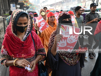 Activists of the Sammilito Garments Sramik Federation (Combined Garments Workers Federation) stage a protest procession against Amazon Compa...