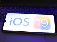 The Apple iOS 19 logo appears on the screen of a smartphone in Reno, United States, on November 29, 2024. (