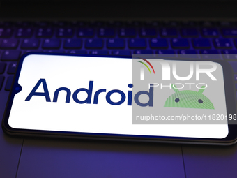 The Android logo appears on the screen of a smartphone in Reno, United States, on November 29, 2024. (