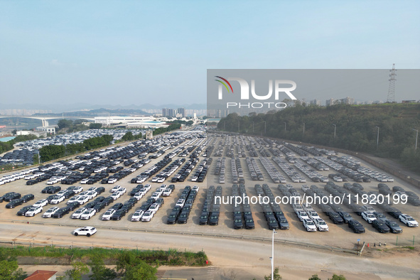 New energy vehicles park in Changansuzuki's parking lot in Chongqing, China, on November 28, 2024. 