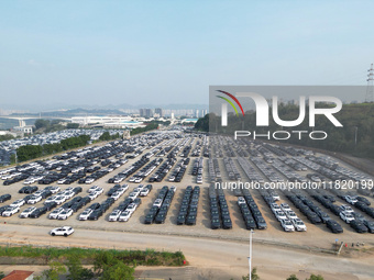 New energy vehicles park in Changansuzuki's parking lot in Chongqing, China, on November 28, 2024. (