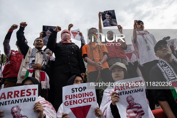 The theatrical performance takes place during the solidarity action for the Palestinian people in front of the United States Embassy in Jaka...