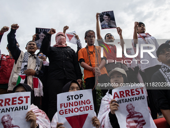 The theatrical performance takes place during the solidarity action for the Palestinian people in front of the United States Embassy in Jaka...