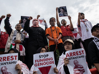 The theatrical performance takes place during the solidarity action for the Palestinian people in front of the United States Embassy in Jaka...