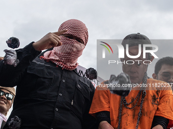 The theatrical performance takes place during the solidarity action for the Palestinian people in front of the United States Embassy in Jaka...