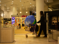 Activists from Elokapina, or Extinction Rebellion Finland, protest against Black Friday in Helsinki, Finland, on November 29, 2024. The acti...