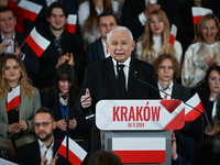 KRAKOW, POLAND - NOVEMBER 24:
Jaroslaw Kaczynski (Center), leader of the opposition Law and Justice party, addresses the crowd during the no...