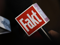 KRAKOW, POLAND - NOVEMBER 24:
A TV Fakt microphone held by a Fakt reporter outside the venue where Karol Nawrocki was officially introduced...