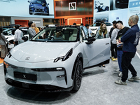 Visitors inspect a ZEEKR X electric car displayed at the Thailand International Motor Expo 2024 at the IMPACT exhibition center in Bangkok,...