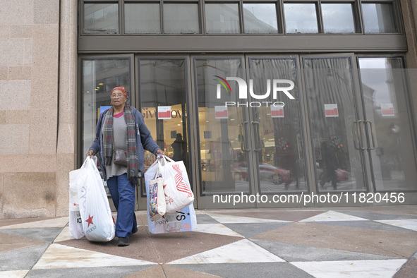 People in the United States shop for good products during the Black Friday deals in Washington, DC, USA, on November 29, 2024, at Macy's mal...