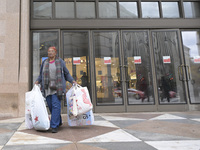 People in the United States shop for good products during the Black Friday deals in Washington, DC, USA, on November 29, 2024, at Macy's mal...