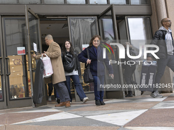 People in the United States shop for good products during the Black Friday deals in Washington, DC, USA, on November 29, 2024, at Macy's mal...