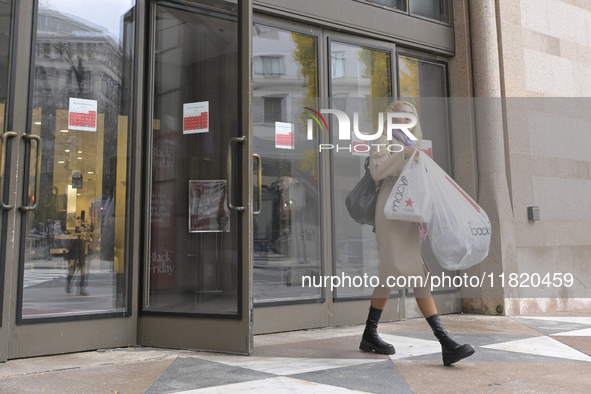 People in the United States shop for good products during the Black Friday deals in Washington, DC, USA, on November 29, 2024, at Macy's mal...