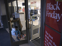 People in the United States shop for good products during the Black Friday deals in Washington, DC, USA, on November 29, 2024, at Macy's mal...