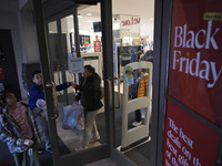 People in the United States shop for good products during the Black Friday deals in Washington, DC, USA, on November 29, 2024, at Macy's mal...