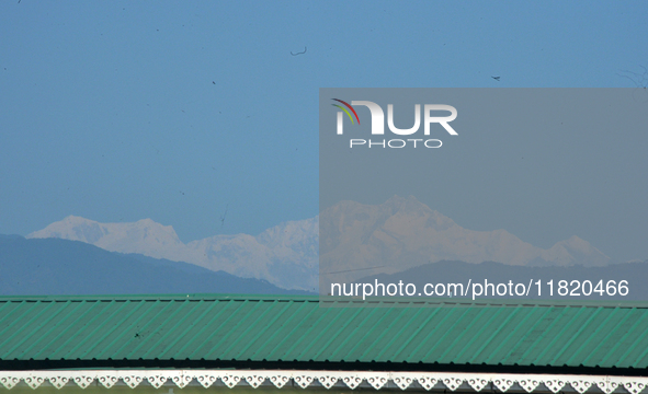 The peak of Kangchenjunga in the eastern Himalayan range is visible from Siliguri, India, on November 29, 2024. 