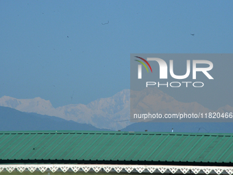 The peak of Kangchenjunga in the eastern Himalayan range is visible from Siliguri, India, on November 29, 2024. (