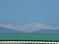 The peak of Kangchenjunga in the eastern Himalayan range is visible from Siliguri, India, on November 29, 2024. (