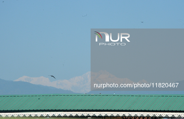 The peak of Kangchenjunga in the eastern Himalayan range is visible from Siliguri, India, on November 29, 2024. 