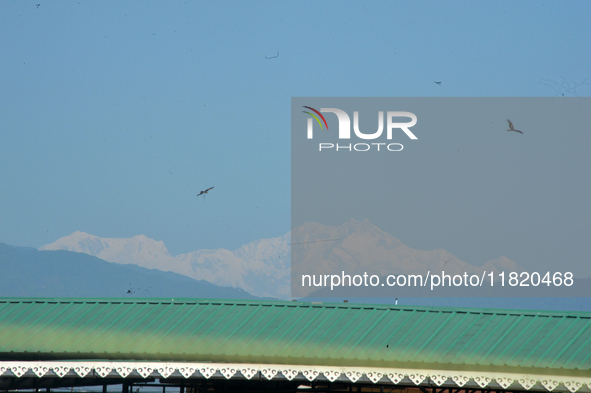 The peak of Kangchenjunga in the eastern Himalayan range is visible from Siliguri, India, on November 29, 2024. 