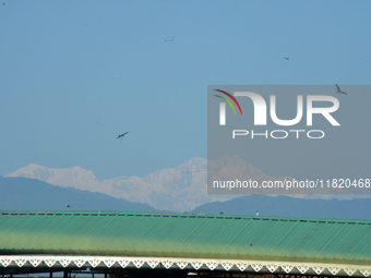 The peak of Kangchenjunga in the eastern Himalayan range is visible from Siliguri, India, on November 29, 2024. (