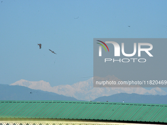 The peak of Kangchenjunga in the eastern Himalayan range is visible from Siliguri, India, on November 29, 2024. (