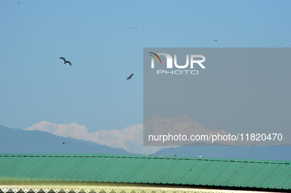 The peak of Kangchenjunga in the eastern Himalayan range is visible from Siliguri, India, on November 29, 2024. 