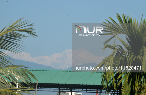 The peak of Kangchenjunga in the eastern Himalayan range is visible from Siliguri, India, on November 29, 2024. 