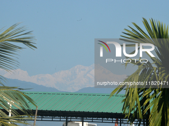 The peak of Kangchenjunga in the eastern Himalayan range is visible from Siliguri, India, on November 29, 2024. (