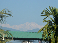 The peak of Kangchenjunga in the eastern Himalayan range is visible from Siliguri, India, on November 29, 2024. (