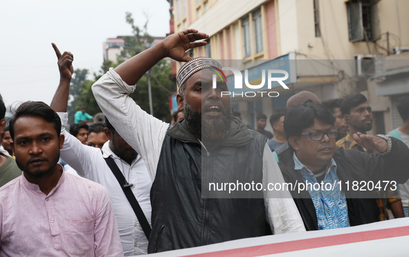 Supporters of the Indian Secular Front (ISF) party seek slogans during a protest march towards the Bangladesh Deputy High Commission against...