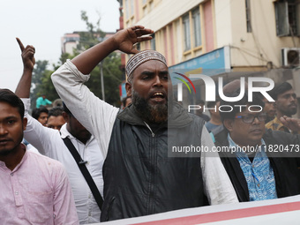 Supporters of the Indian Secular Front (ISF) party seek slogans during a protest march towards the Bangladesh Deputy High Commission against...